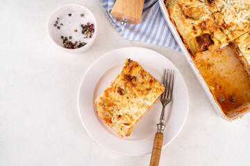 Vegetable healthy diet zucchini lasagna, layered zucchini lasagna stuffing baking with chicken meat, mushrooms and yogurt sauce