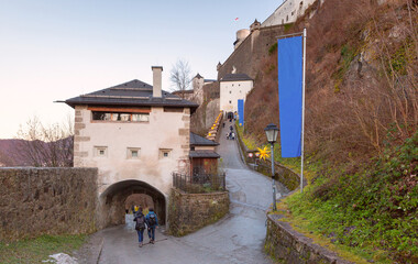 Visitors walking the uphill path to Hohensalzburg Fortress in Salzburg, Austria