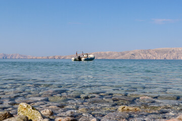 boat in the transparent water of the sea