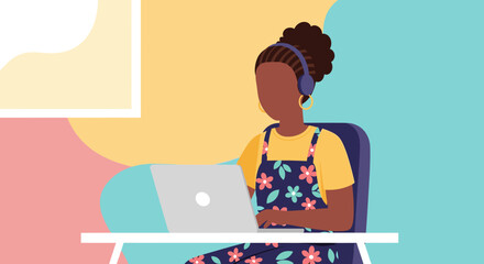 Young Black woman with headphones working on a laptop at a desk, enjoying a creative and focused remote work experience.