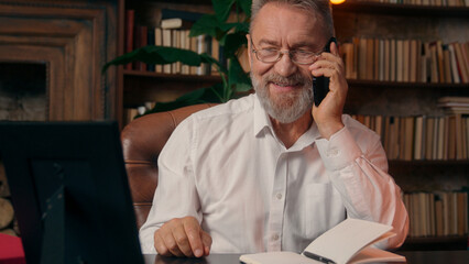 Confident successful old Caucasian man male mature takes off glasses looking at camera folded hands...