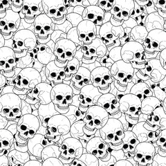 A dense compilation of white skulls creating an intricate and detailed artistic pattern