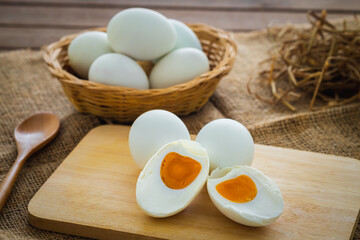 Salted duck eggs on wooden board