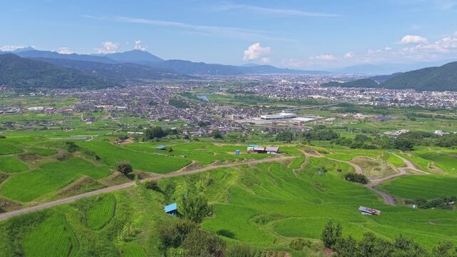 Aerial View of Obasute Terraced Rice Fields Overlooking Chikuma City and Chikuma River, Nagano, Japan