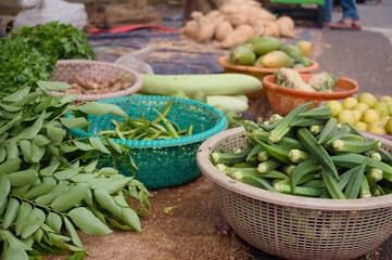 Fresh vegetables displayed at a local market in daylight
