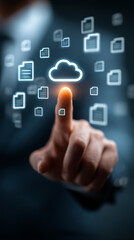 Finger touching a cloud icon surrounded by document icons on a screen