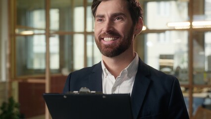 Caucasian business man reading documents analyst broker real estate agent in office businessman...