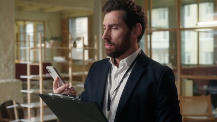Angry man business employer annoyed businessman guy talking mobile phone in office male director...