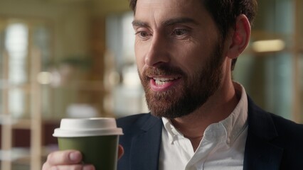 Caucasian business man guy drink coffee in office morning delicious beverage foretaste businessman...