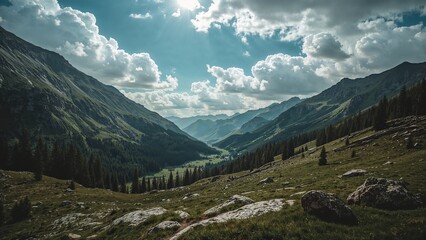 Mountain valley vista under a partly cloudy sky.