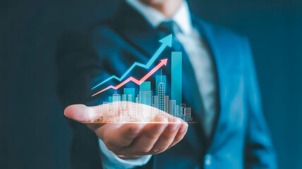 A professional business concept image showing a person in a dark blue suit holding a holographic cityscape projection in their palm.