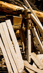 Woodworking with various wooden pieces and tools