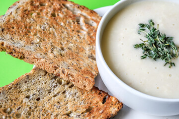  Bowl Of Traditional Chicken Soup With thyme Garnish And Toast