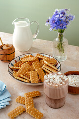 Sweet Treats Cookies Hot Chocolate Milk and Flowers