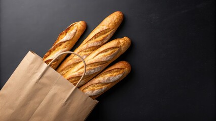 Four golden-brown baguettes in a brown paper bag, dark background, rustic style, bakery, fresh bread, appetizing, food photography, overhead shot, copy space.