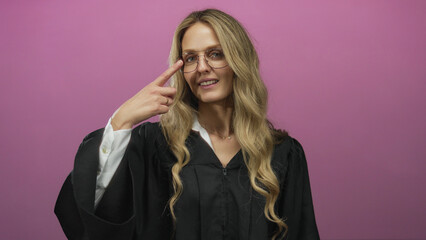 Woman wearing judicial uniform points to glasses, standing in front of pink wall, embodying...