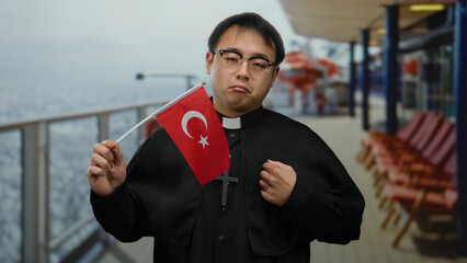 Priest holding turkish flag on cruise ship deck with ocean backdrop and sun loungers creates a...