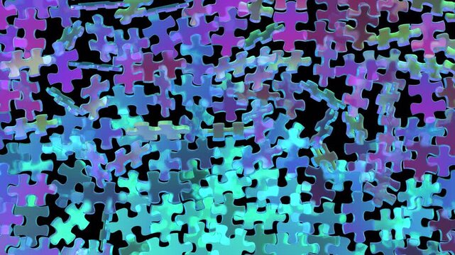 Video footage of animated 3D jigsaw puzzle pieces floating and moving in space with vibrant green, blue, and purple gradient colors.