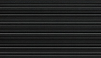 Close-up view of a black corrugated surface.  Parallel horizontal lines create a repeating pattern