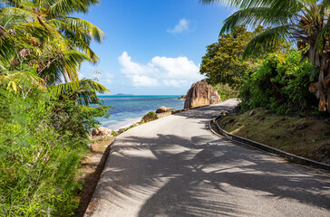 Obraz premium Scenic road in the west of Island Praslin, Republic of Seychelles, Africa.