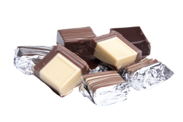 a pile of chocolates sitting on top of foil