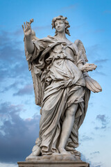 A marble statue of an angel, among those on the Ponte Sant'Angelo in Rome, Italy. The angel...