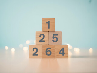 Wooden blocks stacked in a staircase pattern with numbers