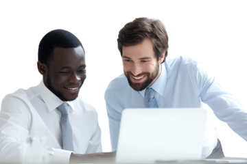 Two smiling businessmen reviewing work on a laptop.