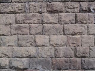 Detailed texture of ancient stone masonry. Old stone wall with textured masonry blocks. Can be used...