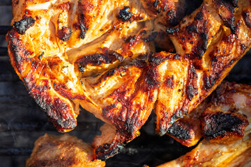 Pork chops, steak, sausages on barbecue grill