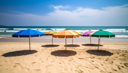 Fototapeta premium Colorful beach umbrellas on a sunny beach