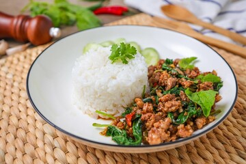 Homemade Rice topped with stir fried Thai basil with minced pork , pad ka praow moo sap