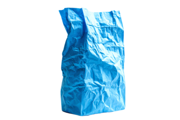 a blue bag is sitting on a white surface