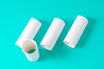 The tissue paper cores or toilet paper tubes on background.