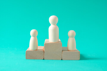 Wooden figure standing ,Concept of business leadership, successful competition.