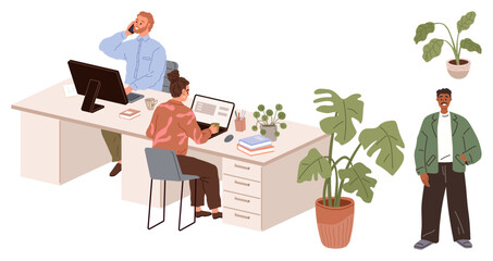 Two colleagues working at desks with desktop and laptop, one talking on phone. Indoor plants add a natural touch, while a standing figure engages casually. Ideal for teamwork, co-working