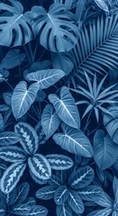 A stunning arrangement of various tropical leaves in a monochromatic blue color palette. This botanical background creates a modern, stylish, and nature-inspired design, ideal for use in wallpapers, p
