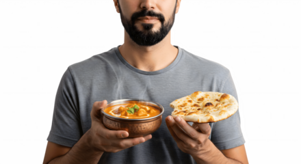 man eating an desi food 