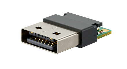 A close up shot of a usb connector with a gray casing and a green circuit board visible on black