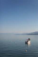 Peaceful calm lake with boat
