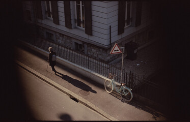 Lady walking down street in Europe