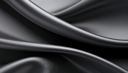 Dark grey fabric drapes in smooth folds