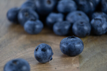 Close-up of blueberries on a wooden tray