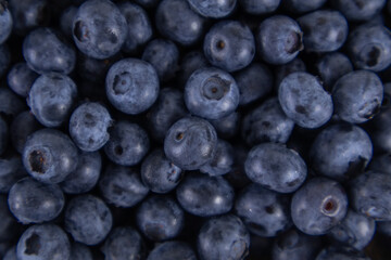 Close-up of blueberries on a wooden tray