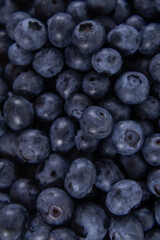 Close-up of blueberries on a wooden tray
