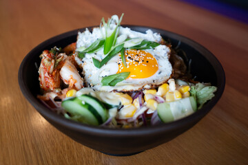 Korean bibimbap bowl with fried egg