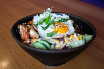 Korean bibimbap bowl with fried egg