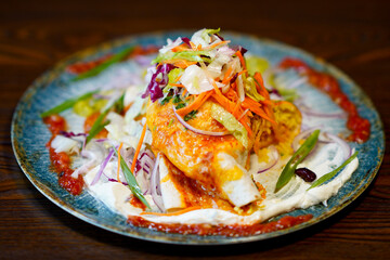 Stuffed burrito with colorful vegetables – top view