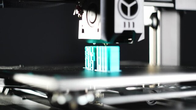 3D printer prints parts from plastic. Manufacturing parts, technologies that simplify the work of factories. High quality 4k footage