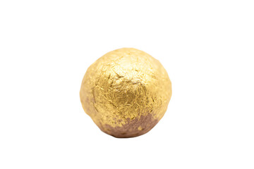Fototapeta premium a gold chocolate ball on a white background